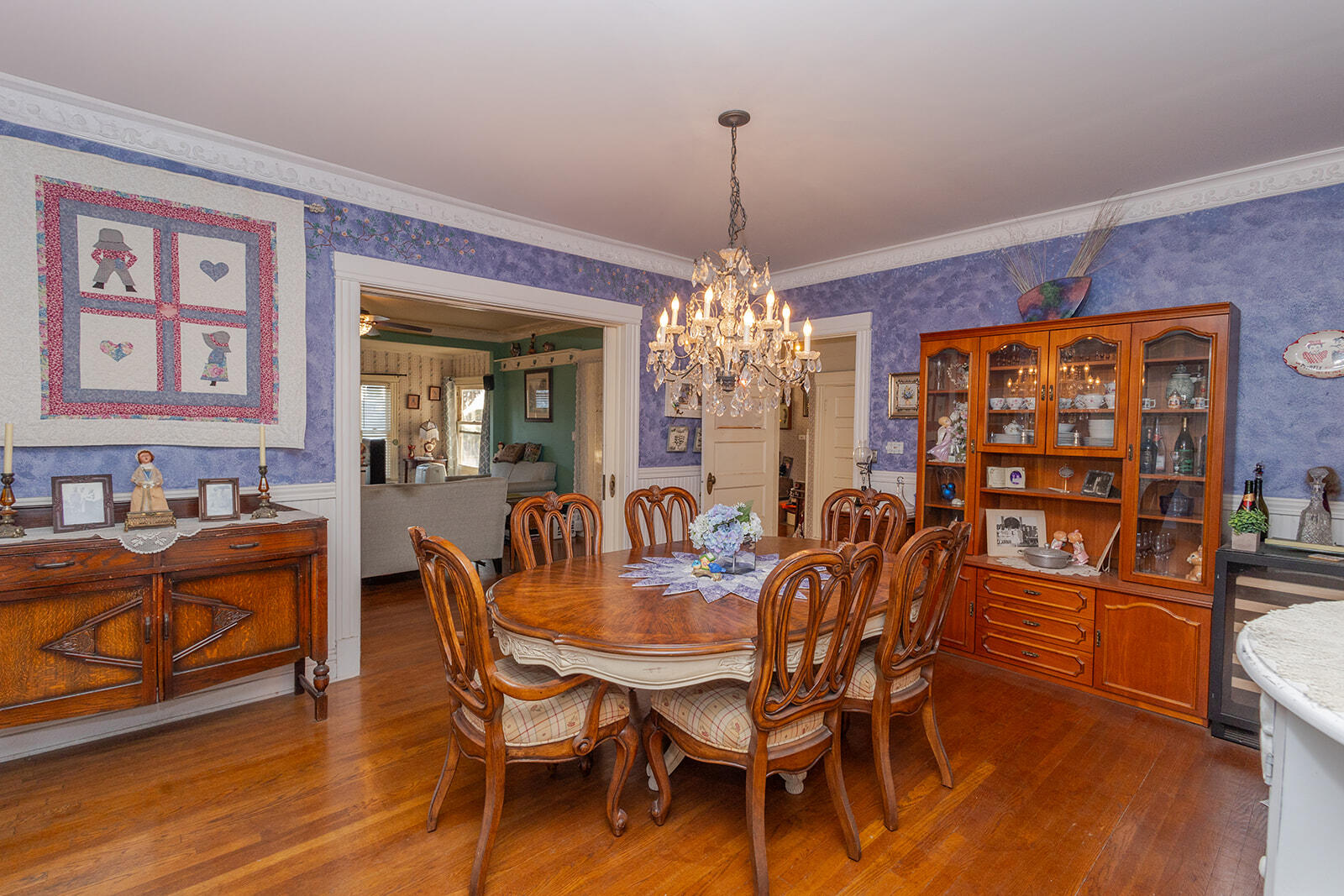 13429 Bailey Street Whittier, CA 90601 - Photo 14 of 54 a view of a dining room with furniture wooden floor and chandelier