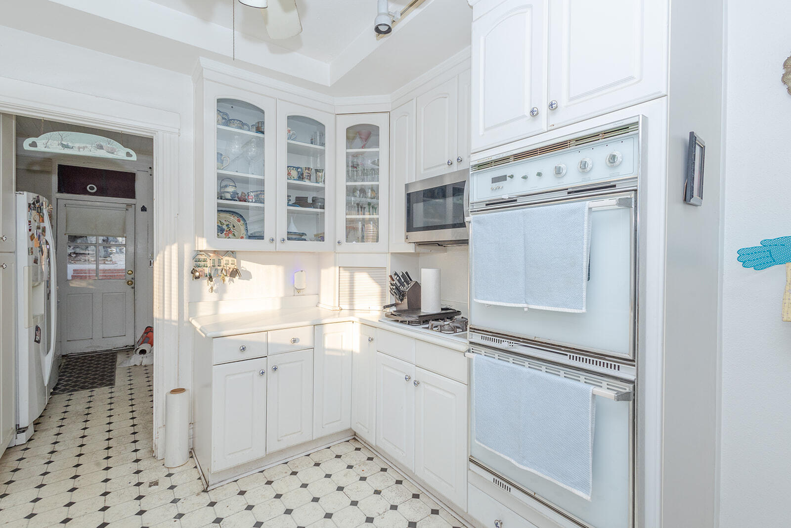 13429 Bailey Street Whittier, CA 90601 - Photo 18 of 54 a kitchen with stainless steel appliances a stove and a refrigerator