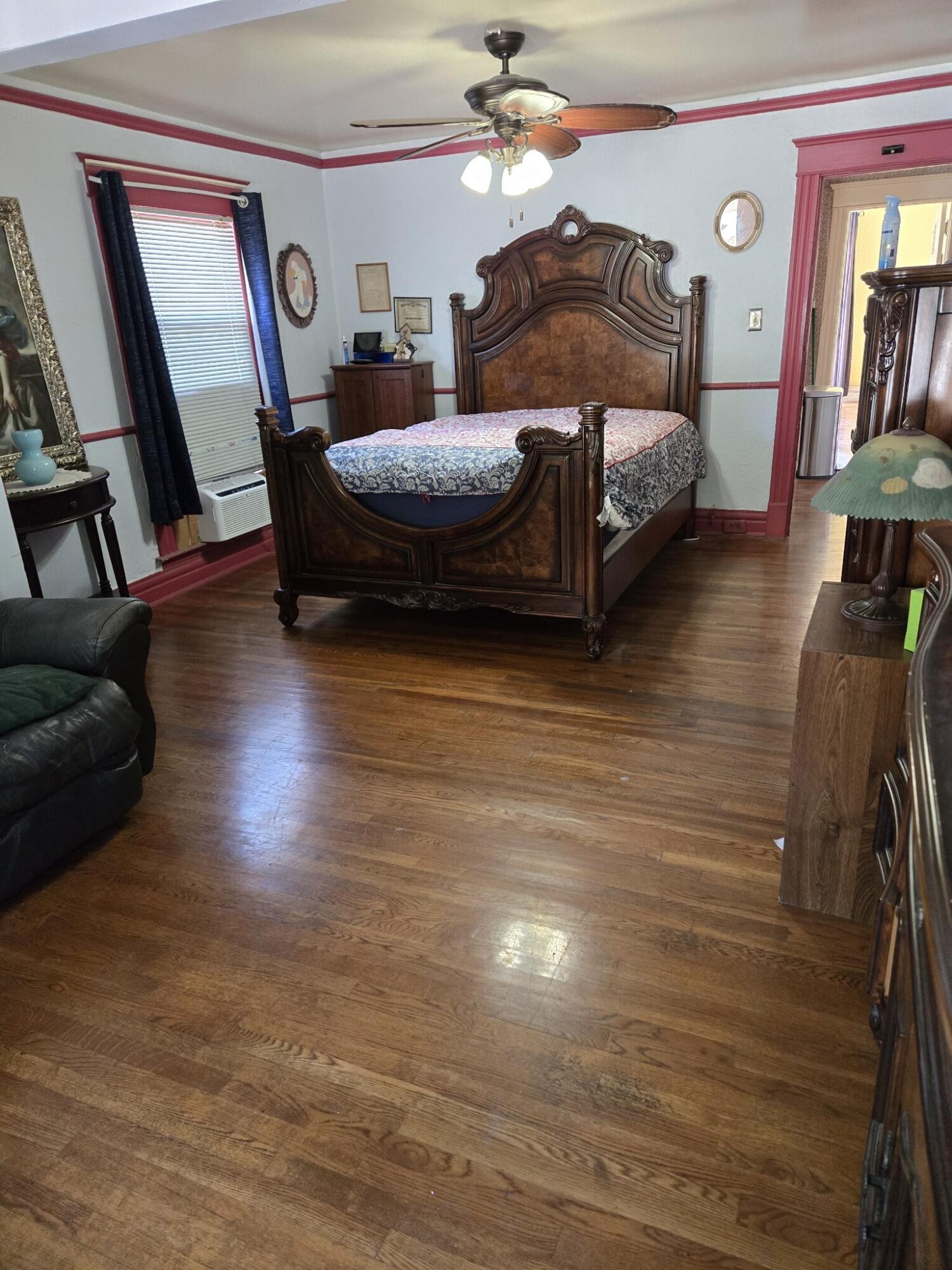 13429 Bailey Street Whittier, CA 90601 - Photo 24 of 54 a living room with furniture and wooden floor