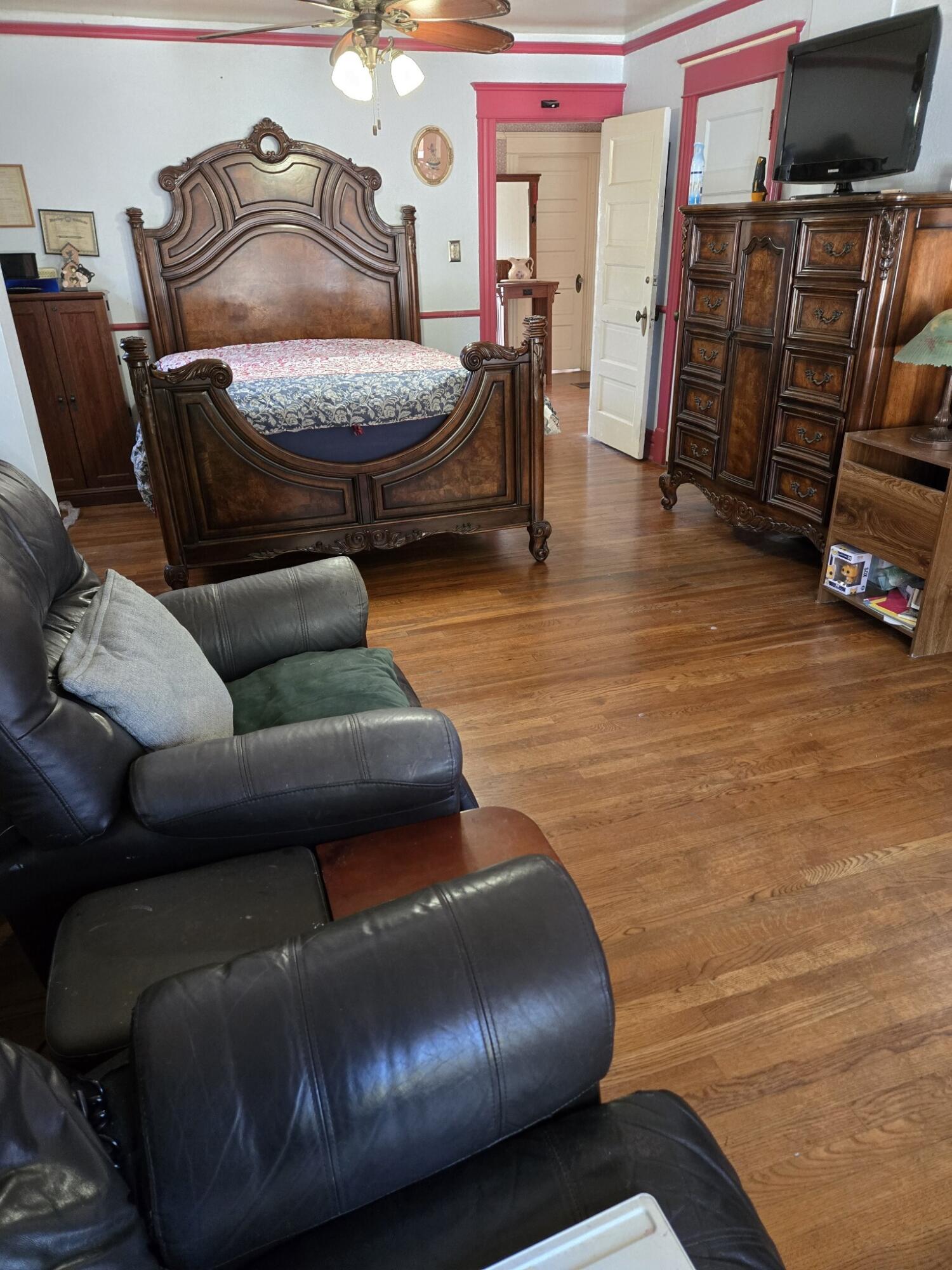 13429 Bailey Street Whittier, CA 90601 - Photo 25 of 54 a living room with furniture and a flat screen tv