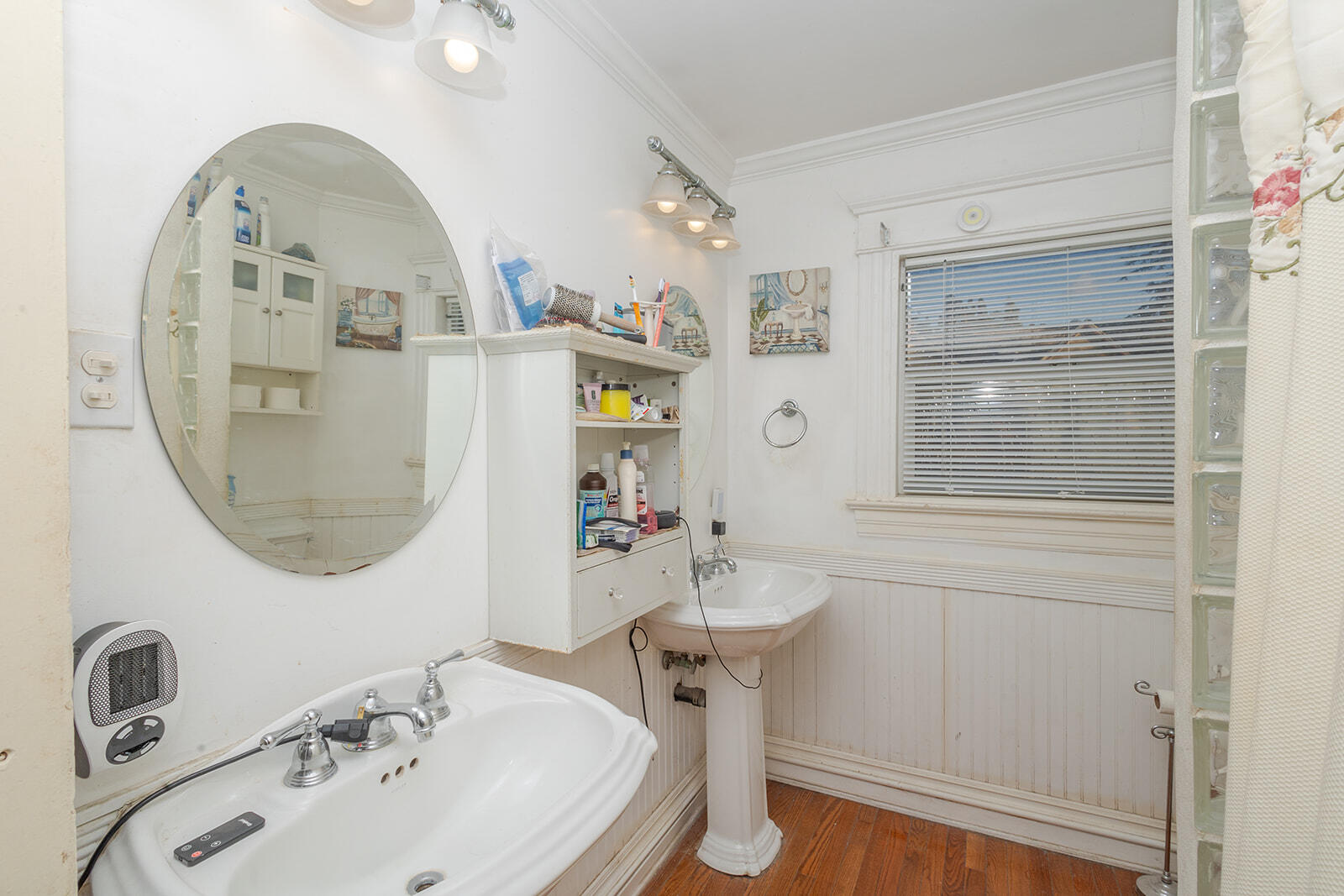 13429 Bailey Street Whittier, CA 90601 - Photo 29 of 54 a bathroom with a sink a toilet and a mirror