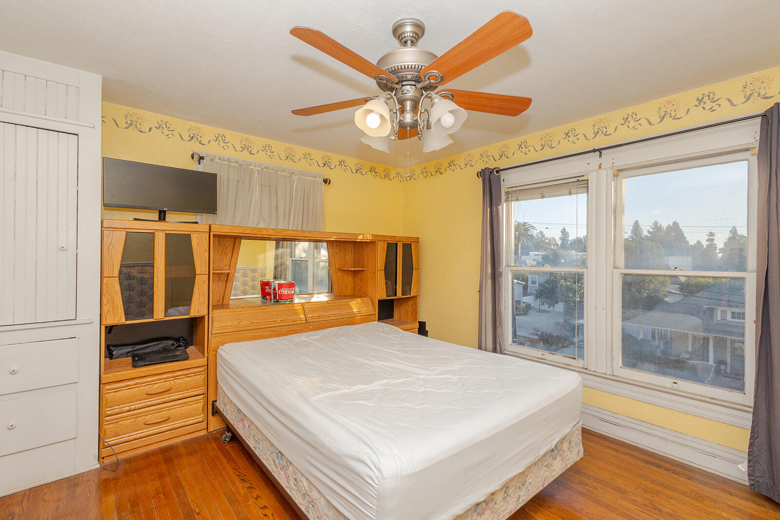 13429 Bailey Street Whittier, CA 90601 - Photo 31 of 54 a bed room with a bed and a large window