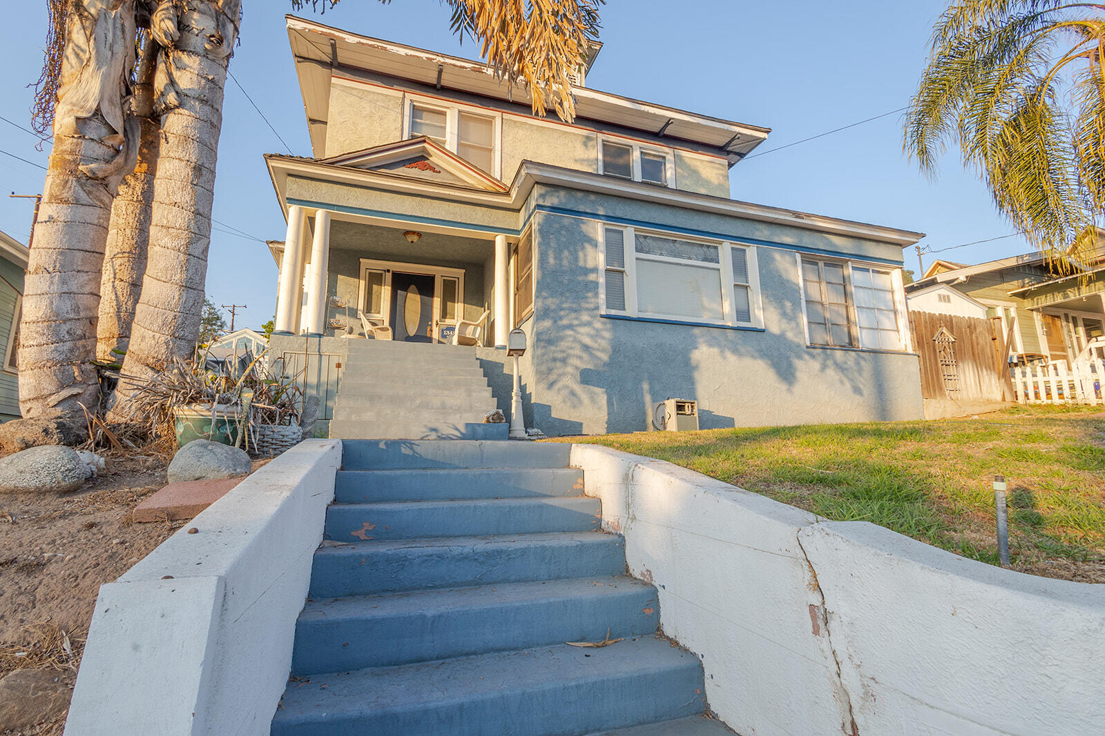 13429 Bailey Street Whittier, CA 90601 - Photo 4 of 54 a view of a house with large windows and flower plants