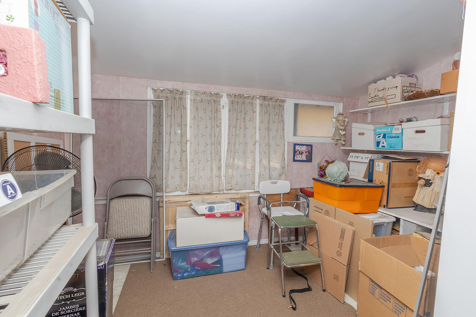 13429 Bailey Street Whittier, CA 90601 - Photo 43 of 54 a room with storage and utility