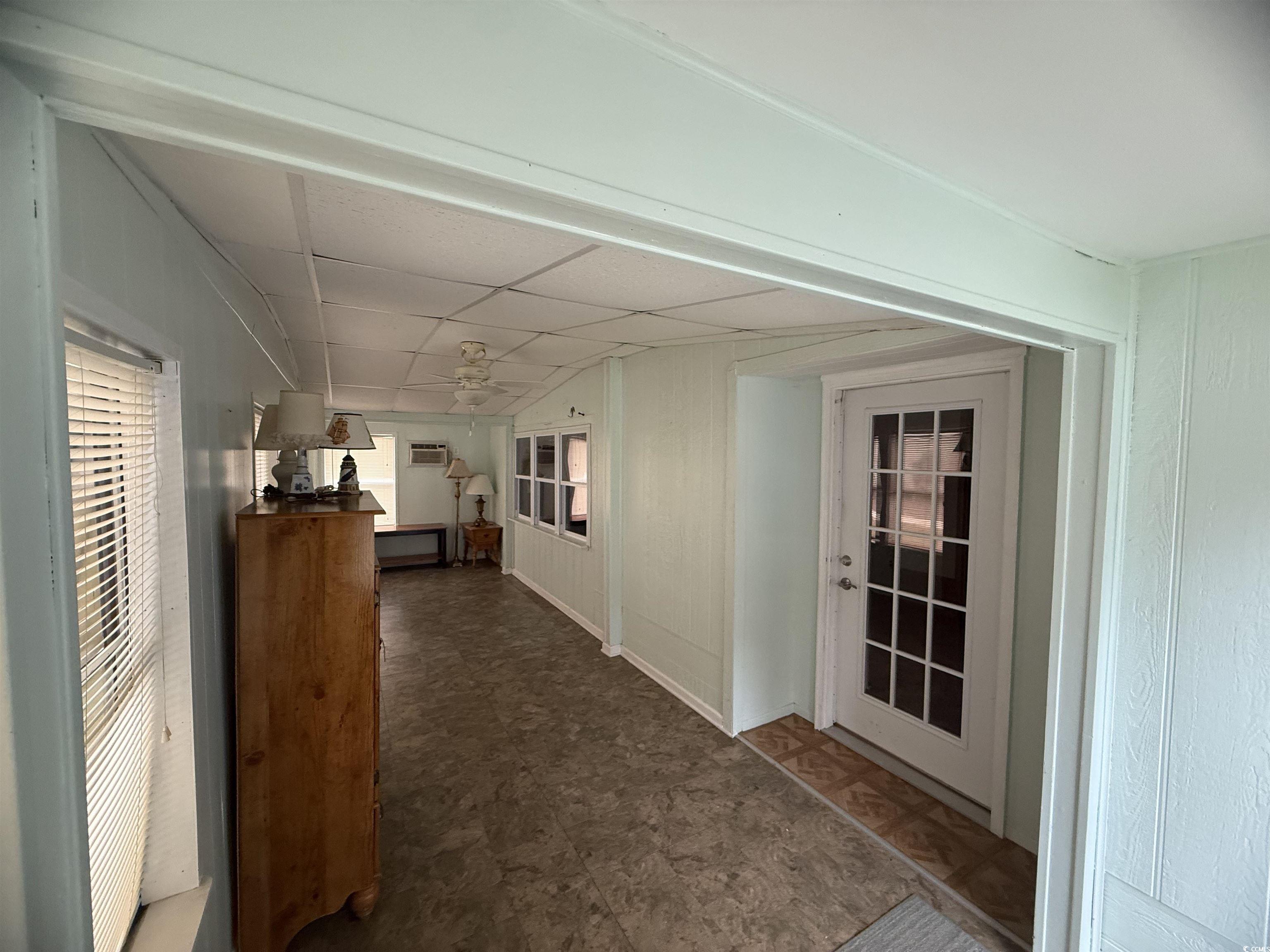 8 Buccaneer Street Murrells Inlet, SC 29576 - Photo 7 of 28 Sunroom with a paneled ceiling and a wall unit AC
