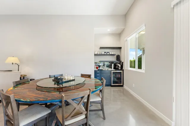 a lobby with furniture and a floor to ceiling window