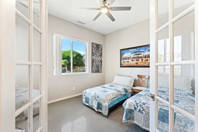 a view of a city with lawn chairs