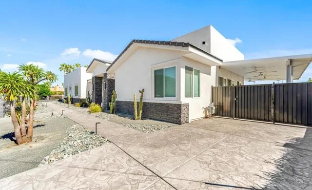 a view of an entryway with a garden
