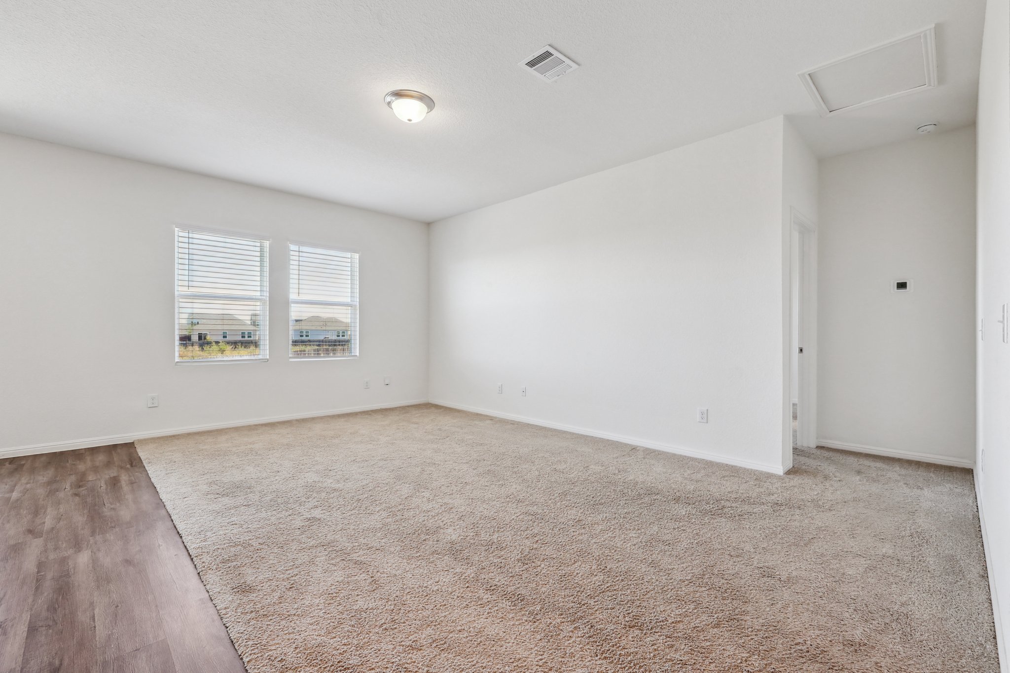 14105 Jeannette Rankin Rd Manor Manor, TX 78653 - Photo 29 of 29 Living area, open floor plan. View from kitchen