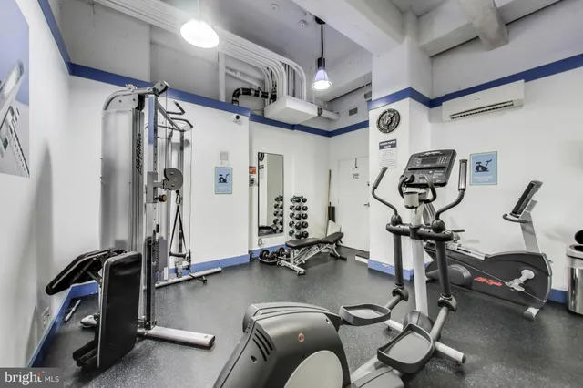 a swimming pool with outdoor seating and yard