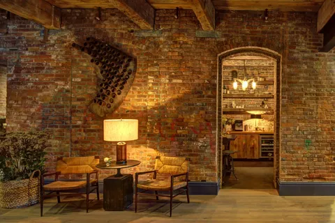 a view of a house with a chairs