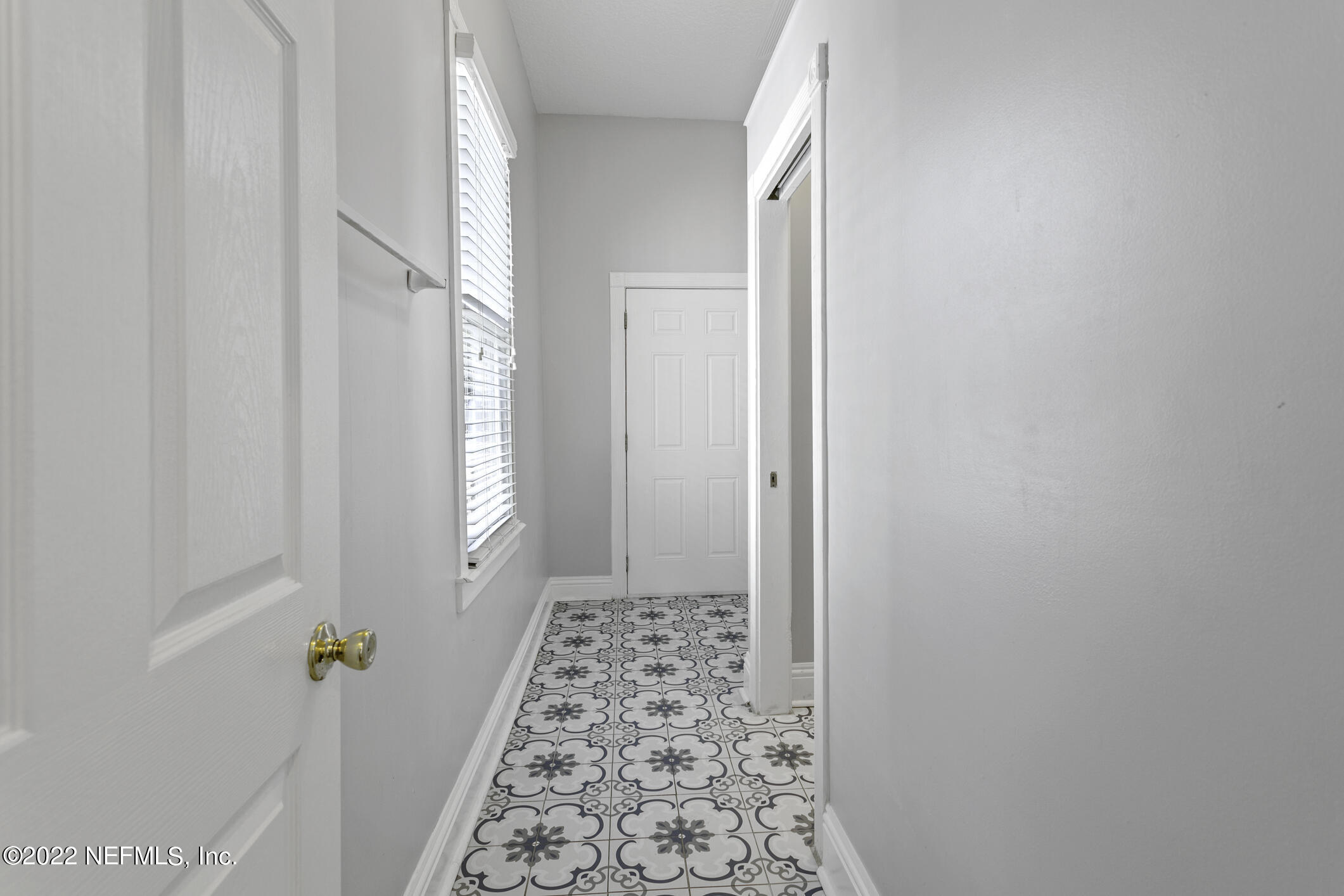 443 East 3rd Street Jacksonville, FL 32206 - Photo 24 of 38 Hall Entry to Guest Bath and Laundry