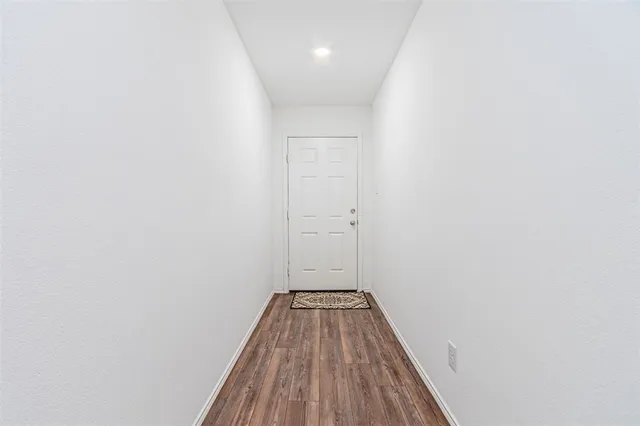 a view of kitchen with wooden floor