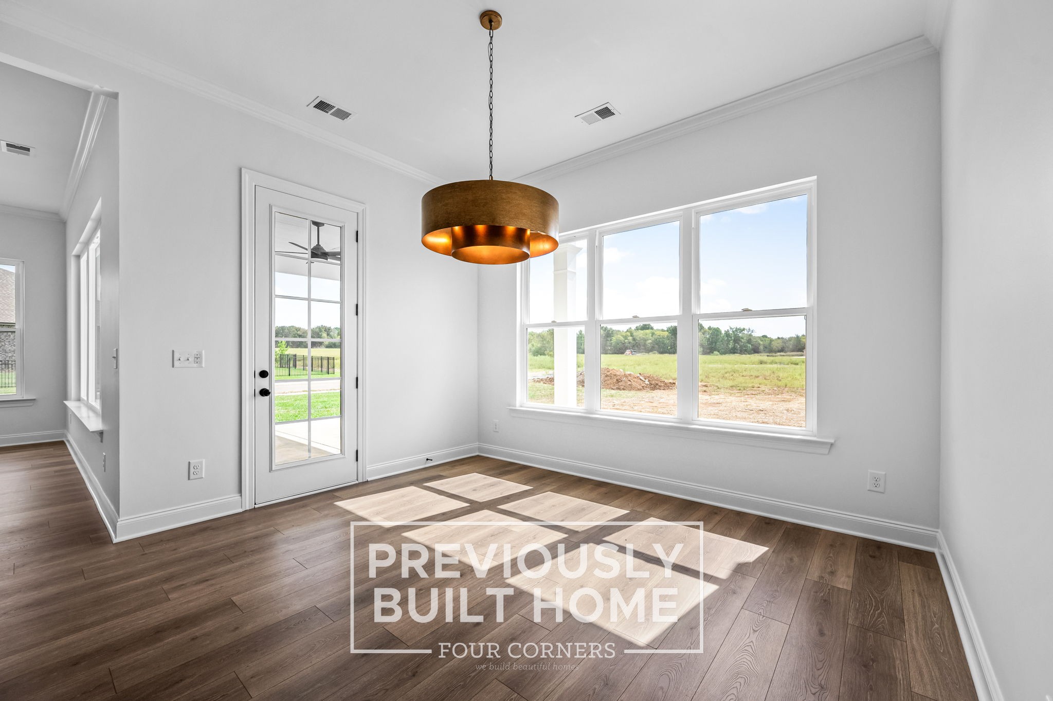 4209 McCown Way Murfreesboro, TN 37127 - Photo 14 of 34 a view of an empty room with wooden floor and a window