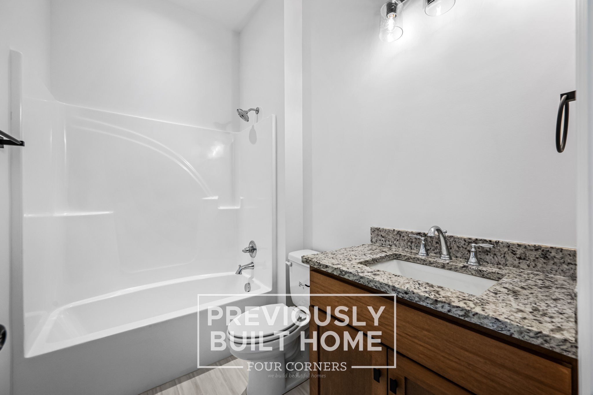 4209 McCown Way Murfreesboro, TN 37127 - Photo 25 of 34 a bathroom with a granite countertop sink a toilet and shower