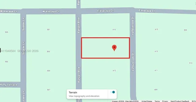 a picture of a bathroom with a white wall