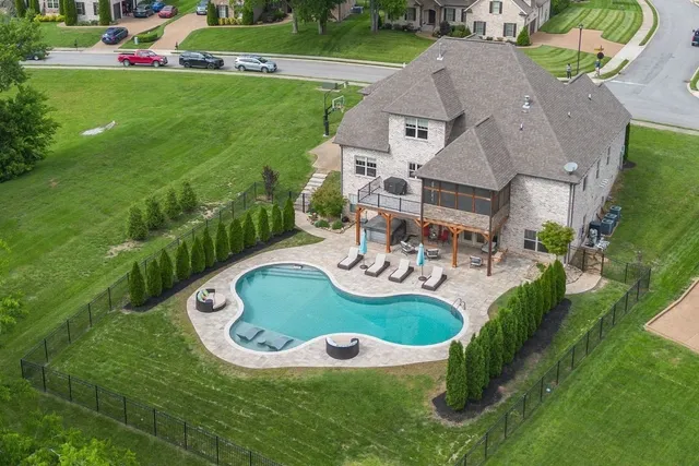 front view of a house and a yard