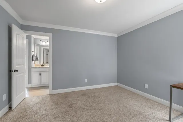 a view of a house and a backyard