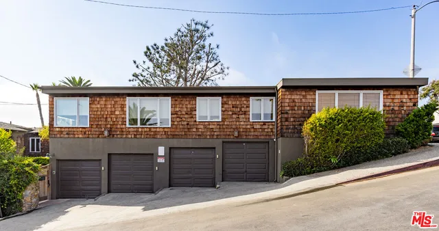 front view of a house with a street