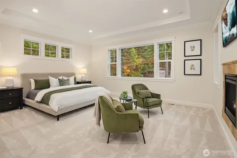 a bedroom with a bed and a couch