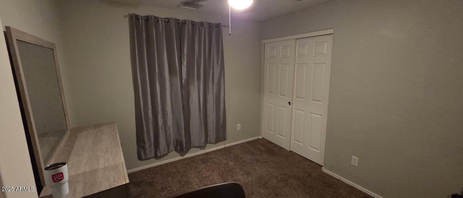 4717 East Redfield Road Gilbert, AZ 85234 - Photo 8 of 13 an entryway with wooden floor