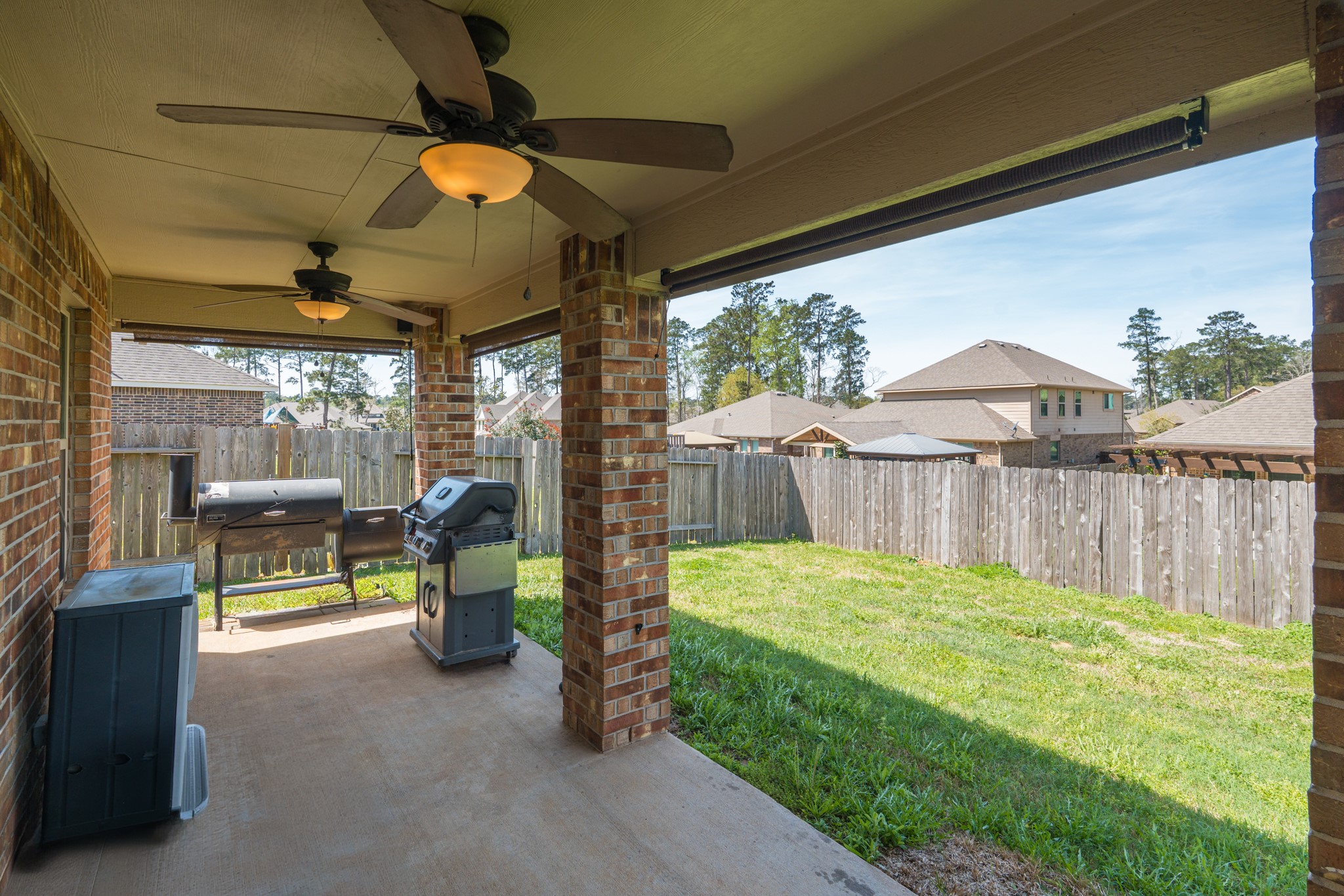 14207 Irvine Rnch Trail Conroe, TX 77384 - Photo 25 of 29 a view of swimming pool with a patio