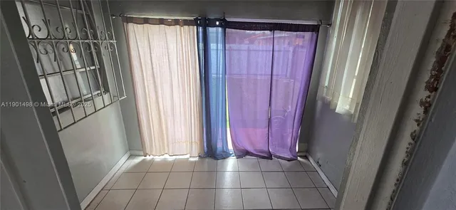 a view of a bathroom with a sink and tub