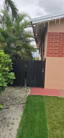 a view of a back yard of the house