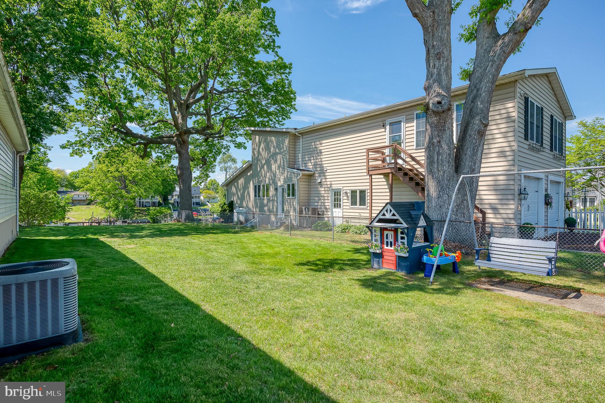 2222 Monocacy Road Essex, MD 21221 - Photo 54 of 70 Spacious backyard with lush greenery.