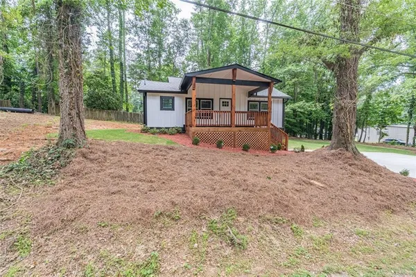 a house view with a outdoor space