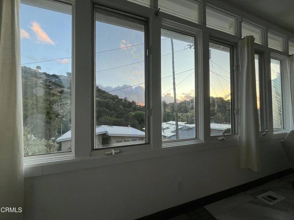 7078 High Cliff Trail Tujunga, CA 91042 - Photo 13 of 47 a view of a glass door and a window