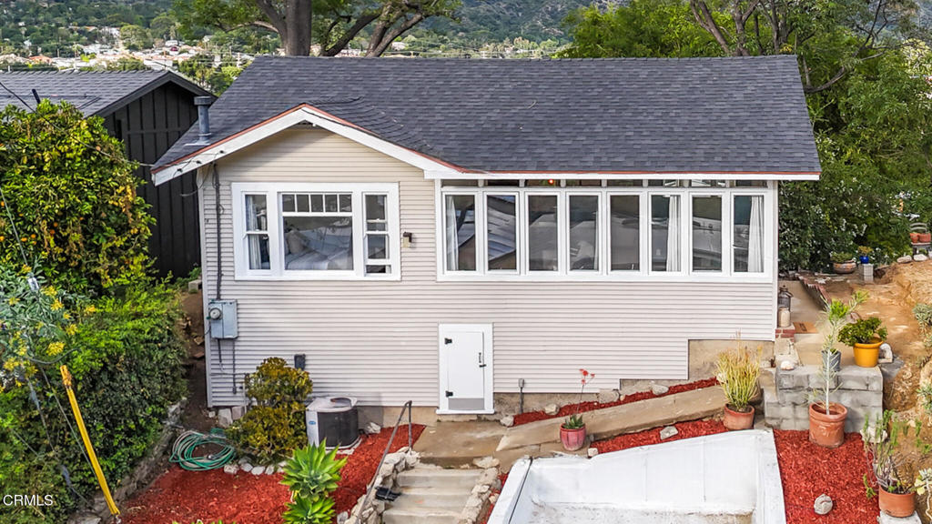 7078 High Cliff Trail Tujunga, CA 91042 - Photo 2 of 47 a front view of a house with a yard