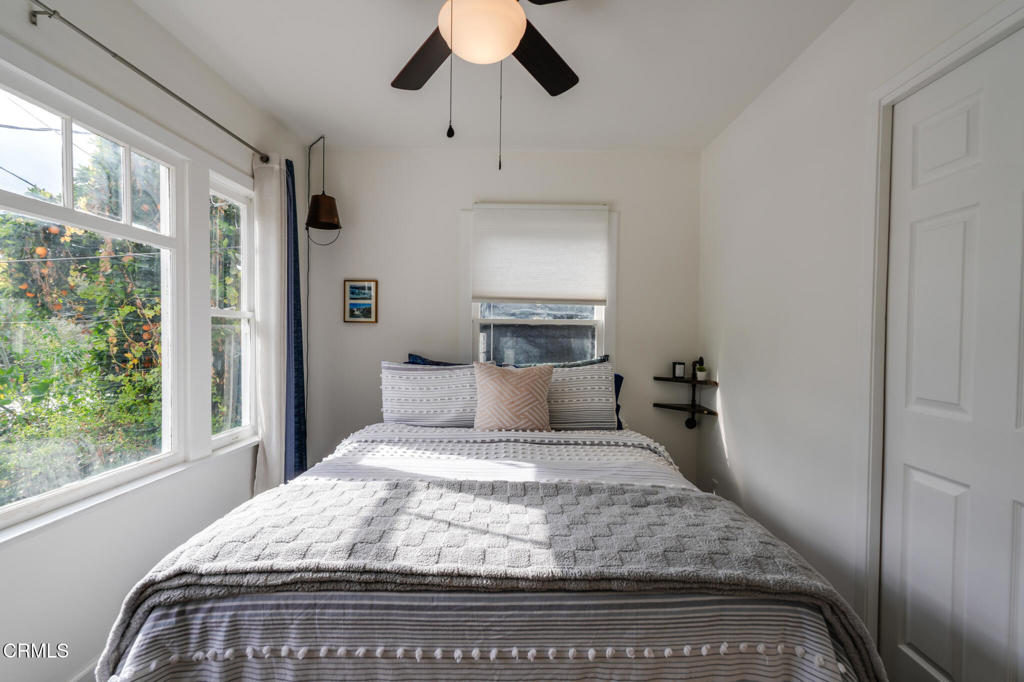 7078 High Cliff Trail Tujunga, CA 91042 - Photo 28 of 47 a bedroom with a bed and a window
