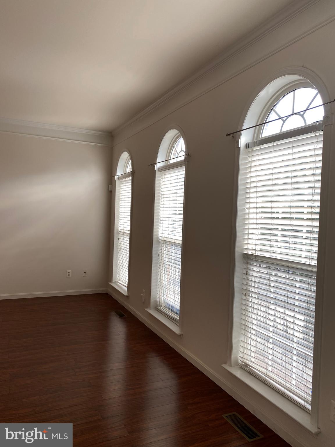 42060 Fremont Preserve Square Aldie, VA 20105 - Photo 14 of 94 a view of a room with wooden floor and windows