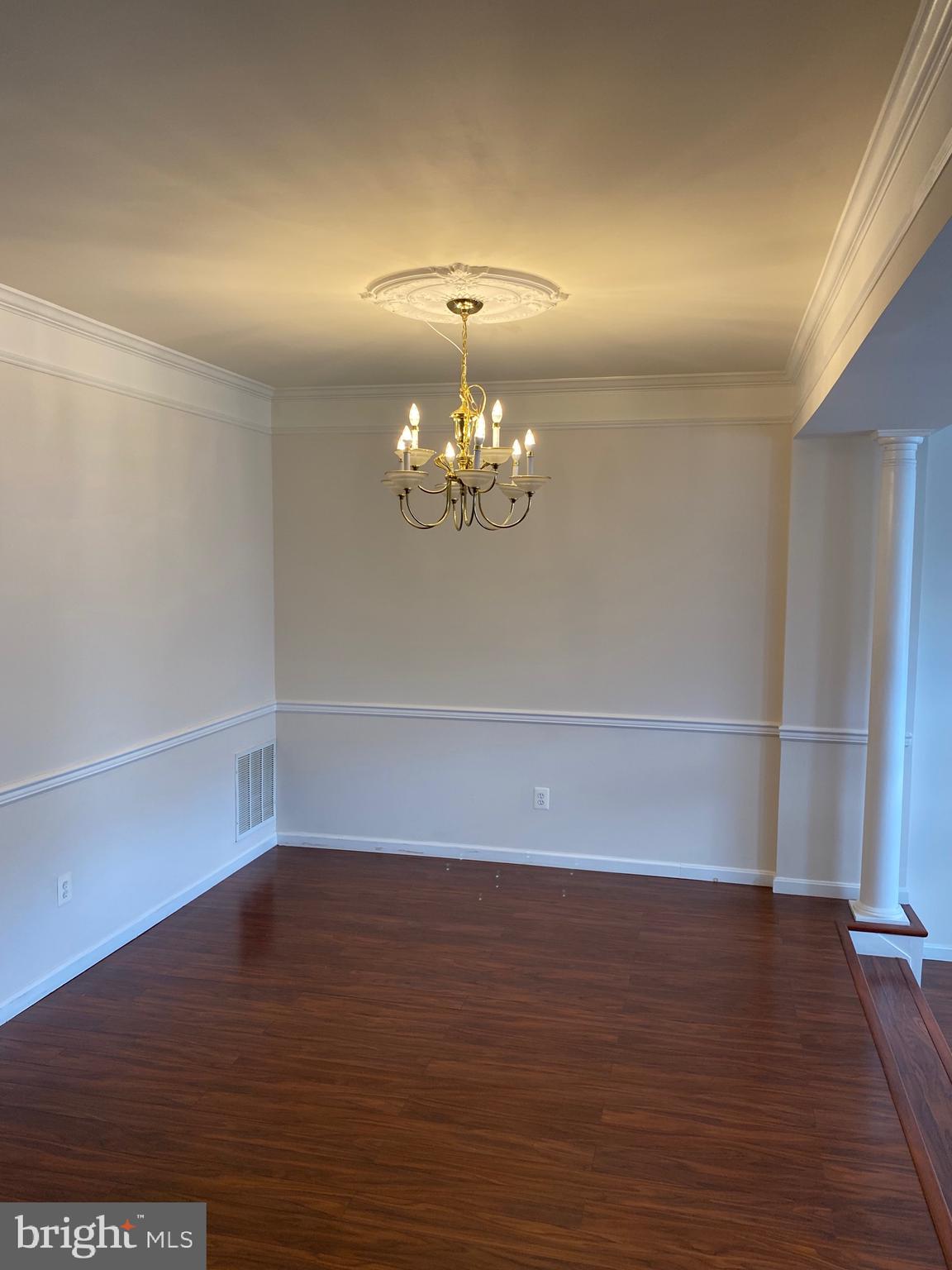 42060 Fremont Preserve Square Aldie, VA 20105 - Photo 19 of 94 a view of an empty room with wooden floor