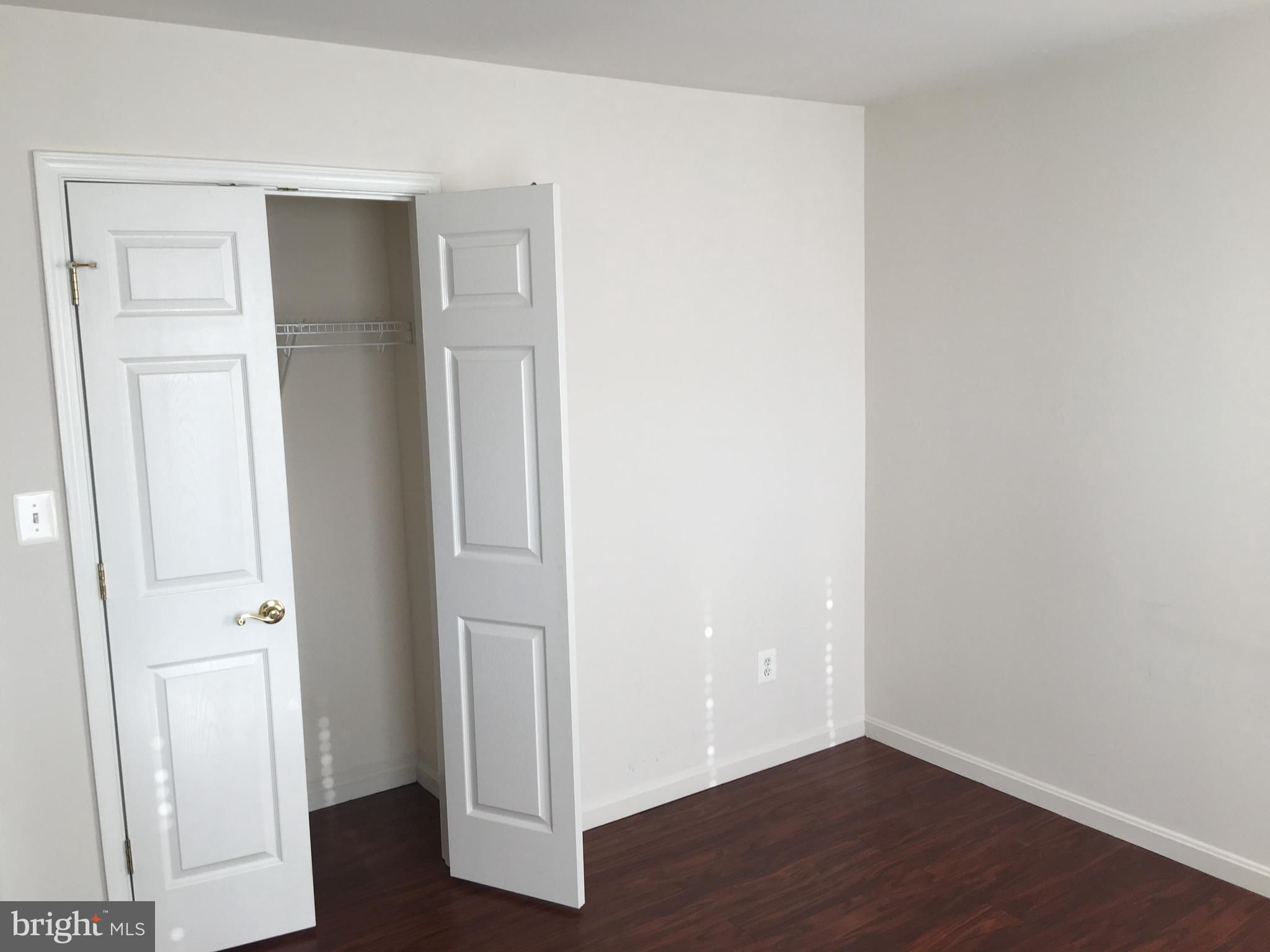 42060 Fremont Preserve Square Aldie, VA 20105 - Photo 45 of 94 a view of an empty room with wooden floor