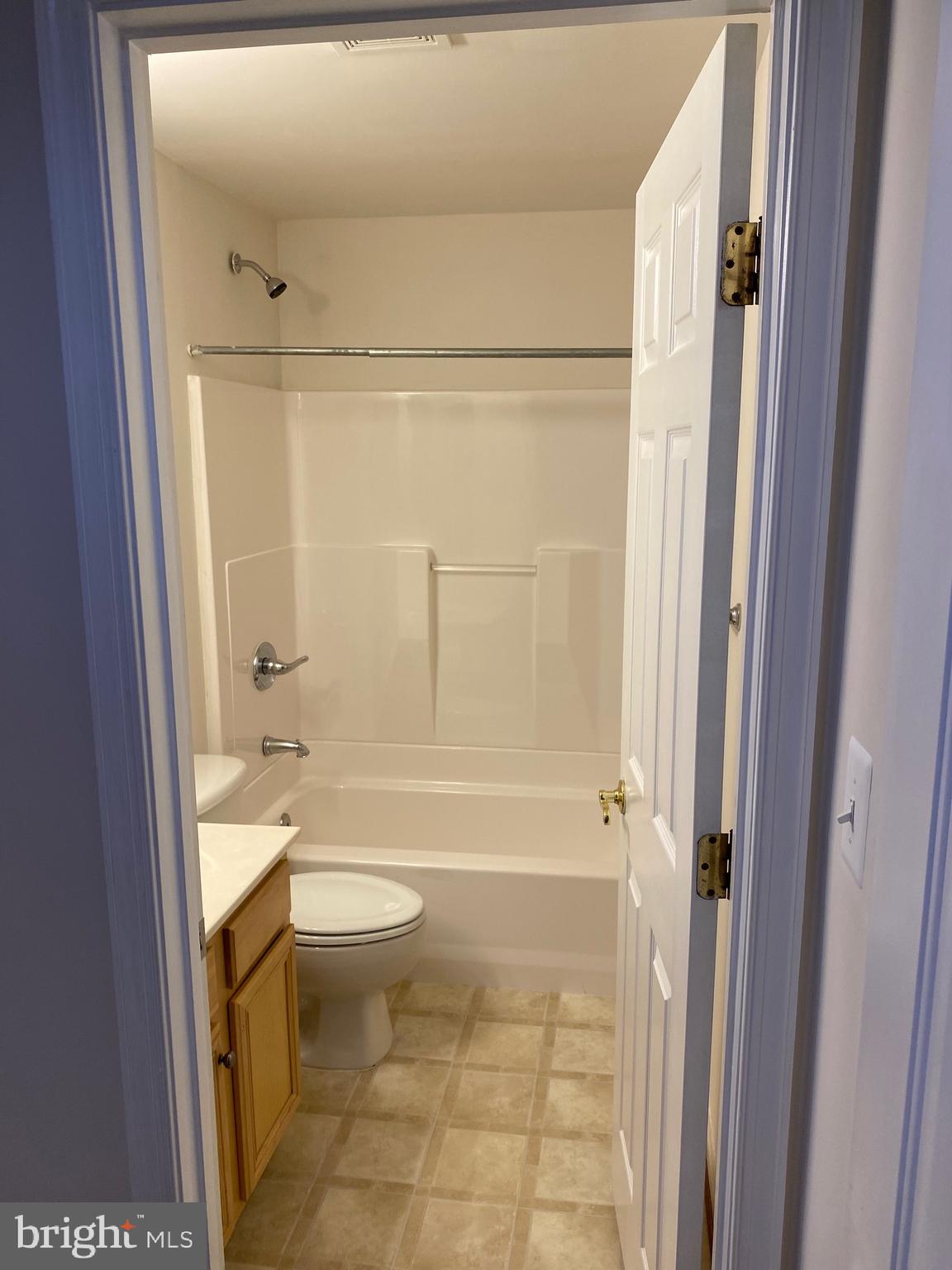 42060 Fremont Preserve Square Aldie, VA 20105 - Photo 81 of 94 a bathroom with a granite countertop sink toilet and shower