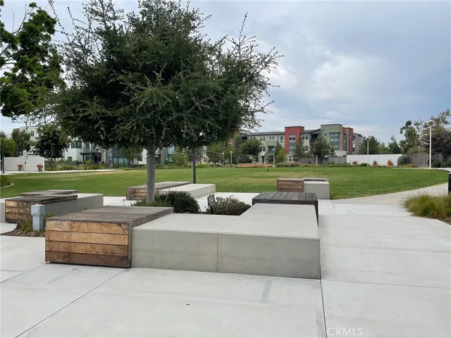 a view of a fountain in front of a house