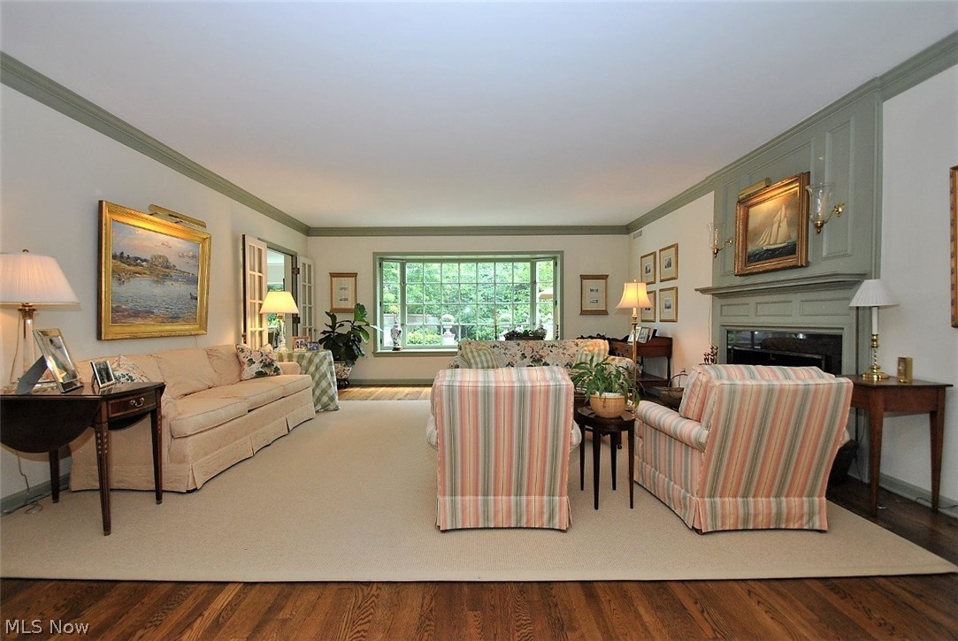 2767 Inverness Road Shaker Heights, OH 44122 - Photo 4 of 35 Spacious formal living room with wood flooring, fireplace and detail molding.