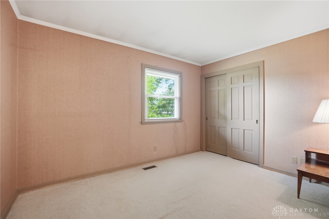 6119 Flemington Road Dayton, OH 45459 - Photo 35 of 76 This bright bedroom offers a peaceful retreat with ample natural light.