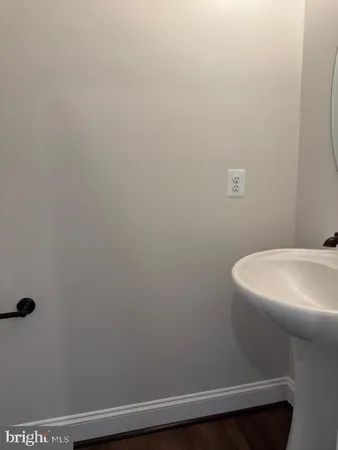 a bathroom with a sink and toilet