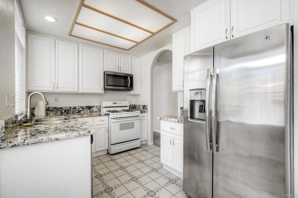 3375 Genoa Way, Unit 144 Oceanside, CA 92056 - Photo 11 of 34 Updated cabinets and counter tops.