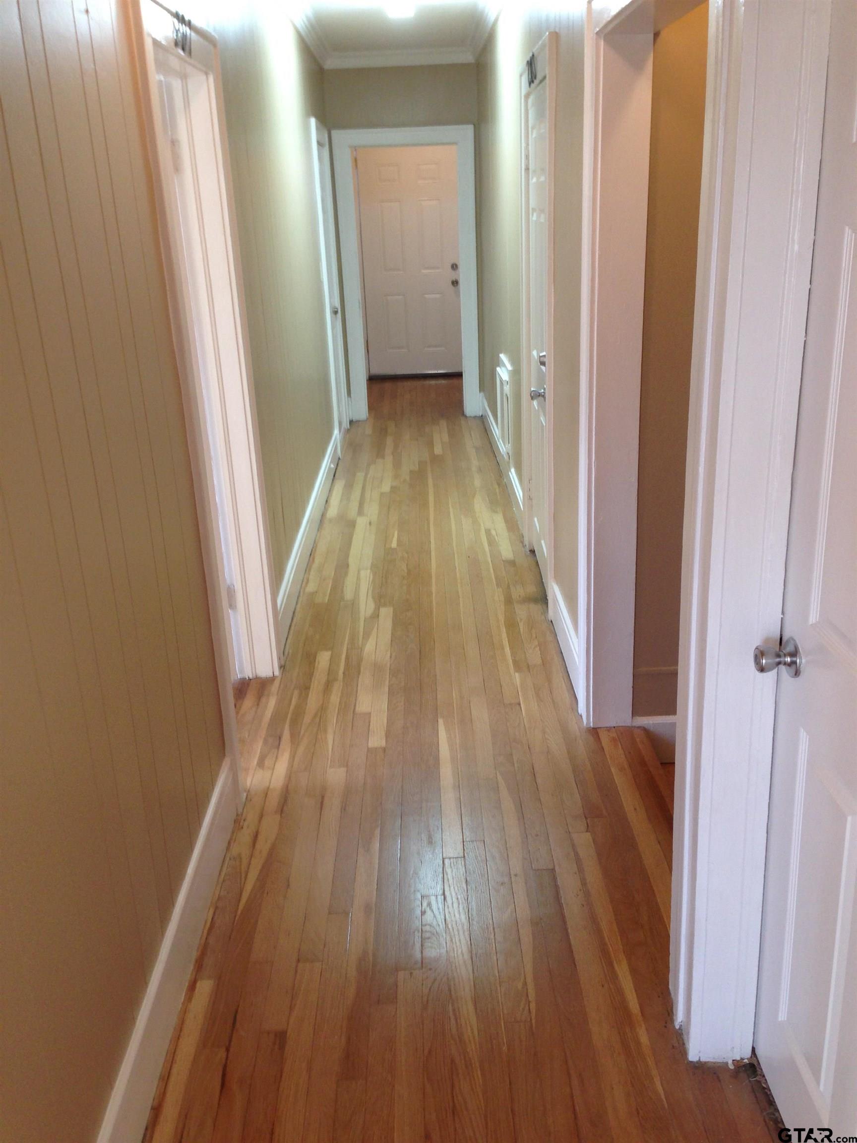 208 West Phillips Street, Unit 200 Tyler, TX 75701 - Photo 11 of 11 a view of a room with wooden floor