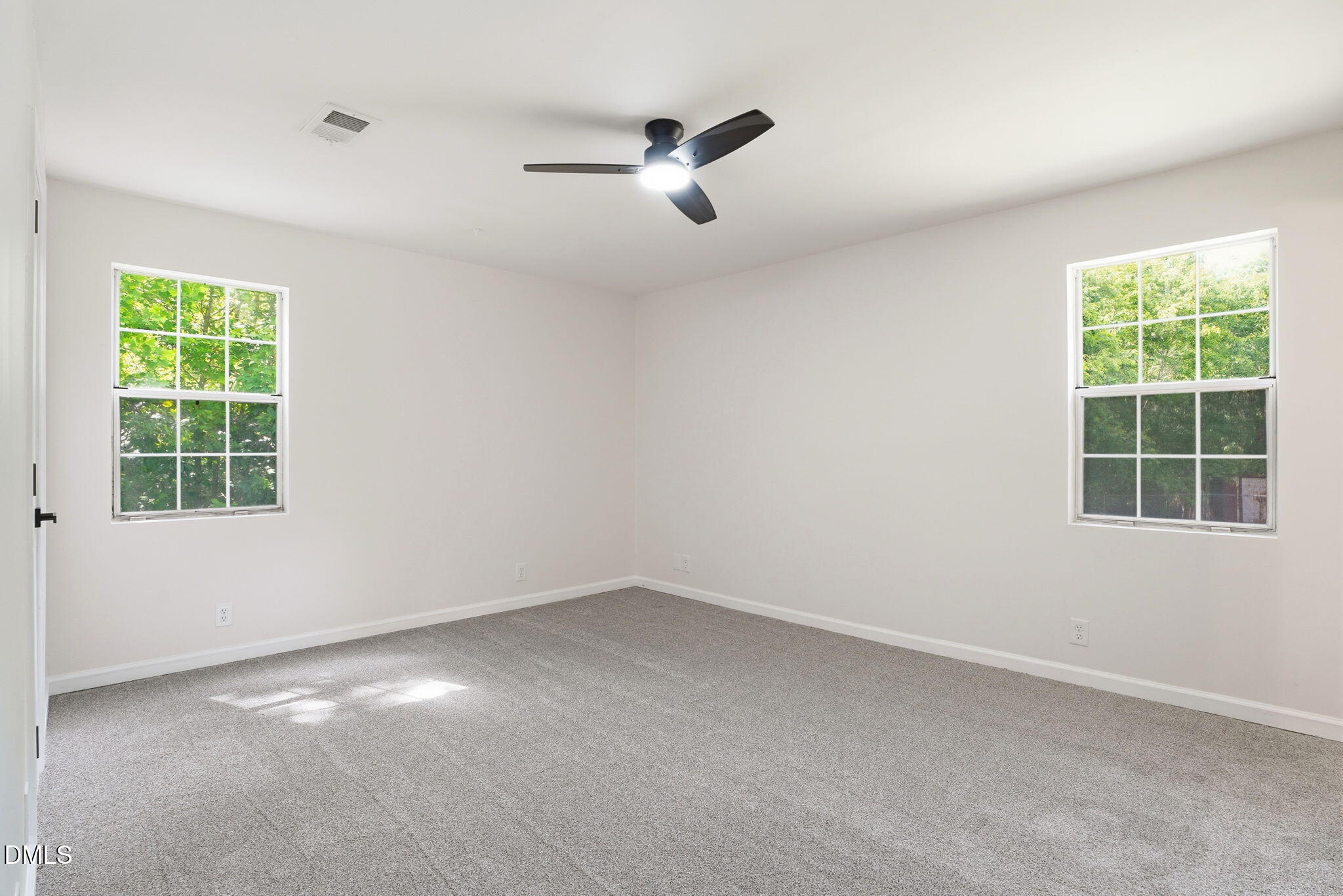 3602 Harrison Road Castalia, NC 27816 - Photo 39 of 48 an empty room with a window