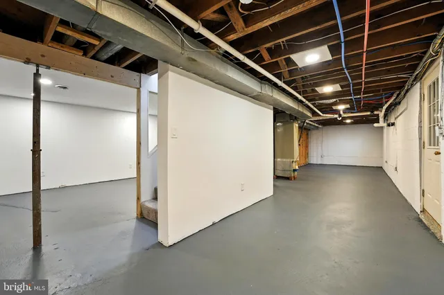 a view of a house with yard and green space