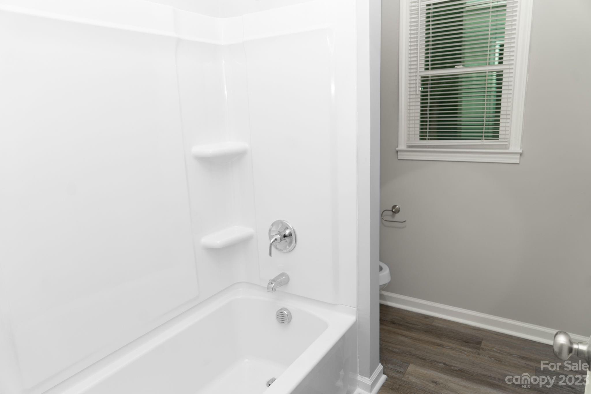 41276 Kings Road New London, NC 28127 - Photo 9 of 12 a bathroom with a bathtub