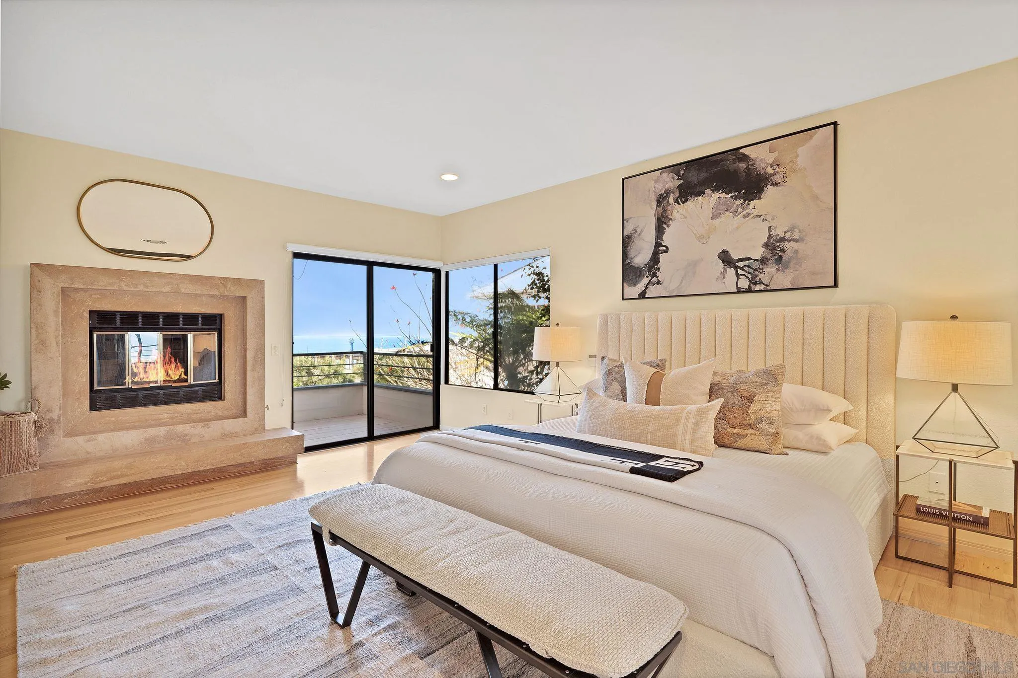 560 Torrey Point Road Del Mar, CA 92014 - Photo 14 of 35 a bedroom with a bed and wooden floor