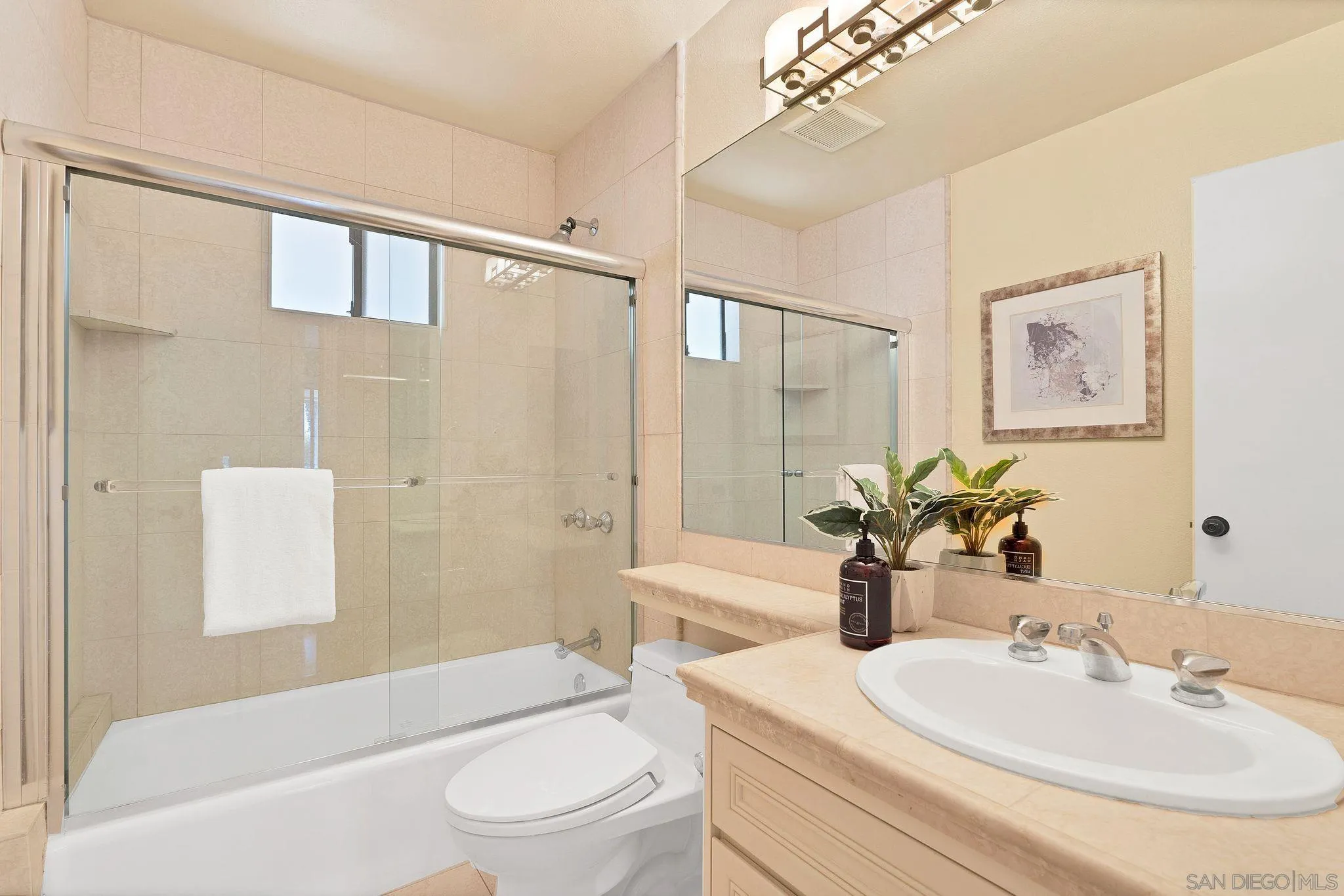 560 Torrey Point Road Del Mar, CA 92014 - Photo 27 of 35 a bathroom with a sink a toilet and shower