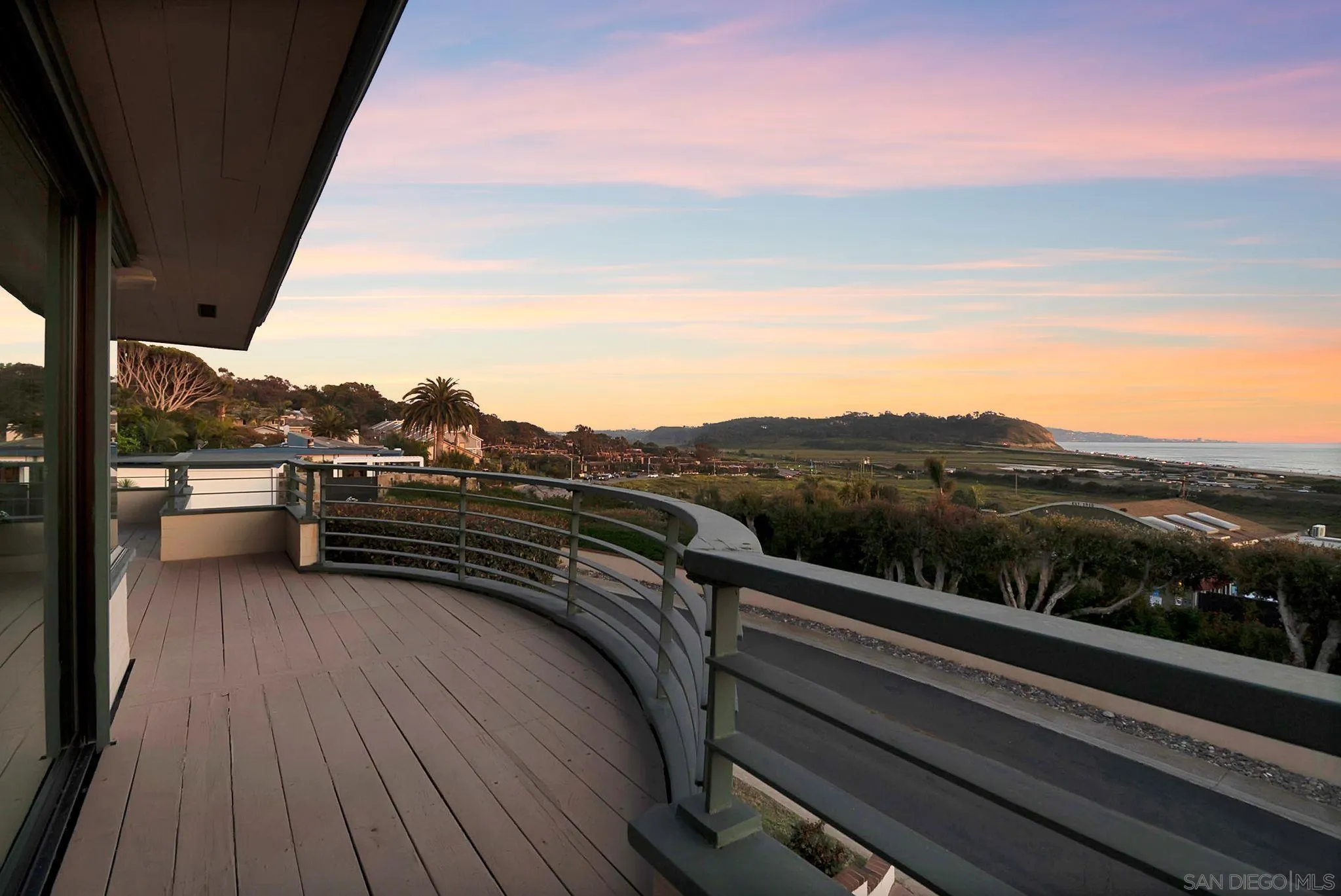 560 Torrey Point Road Del Mar, CA 92014 - Photo 32 of 35 a view of a balcony with mountain view and wooden floor