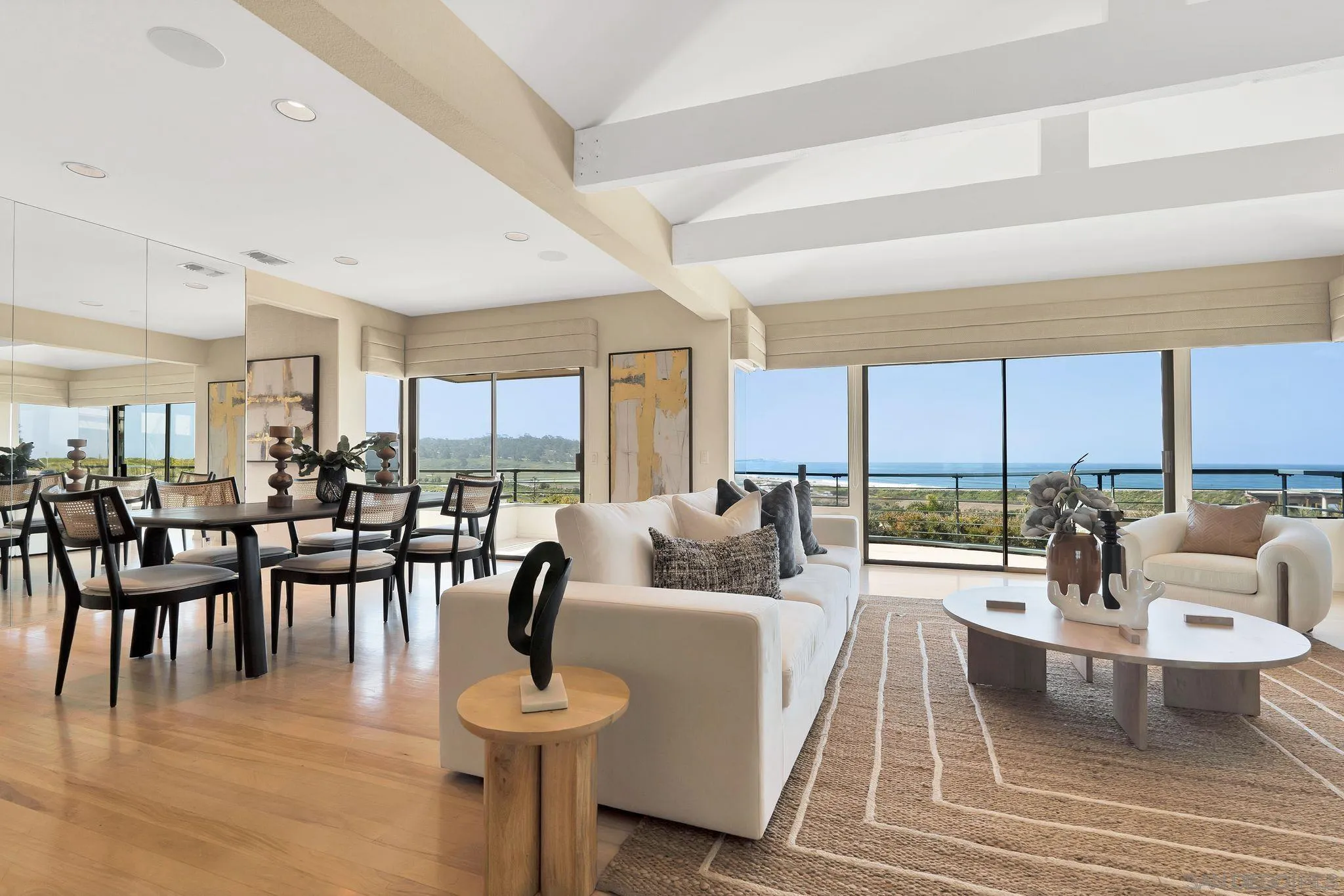 560 Torrey Point Road Del Mar, CA 92014 - Photo 5 of 35 a living room with furniture and a large window